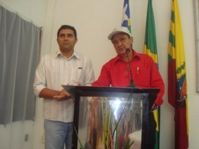Tcnico do Emater,Andr Rocha,ao lado do Governador do Estado